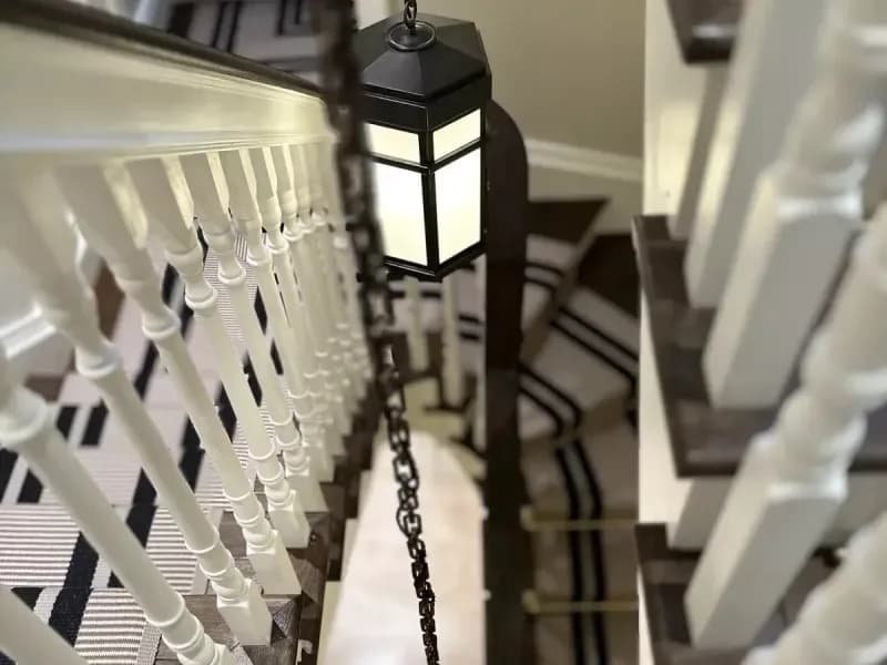 Decorative lanterns and warm downlights in a hospitality interior