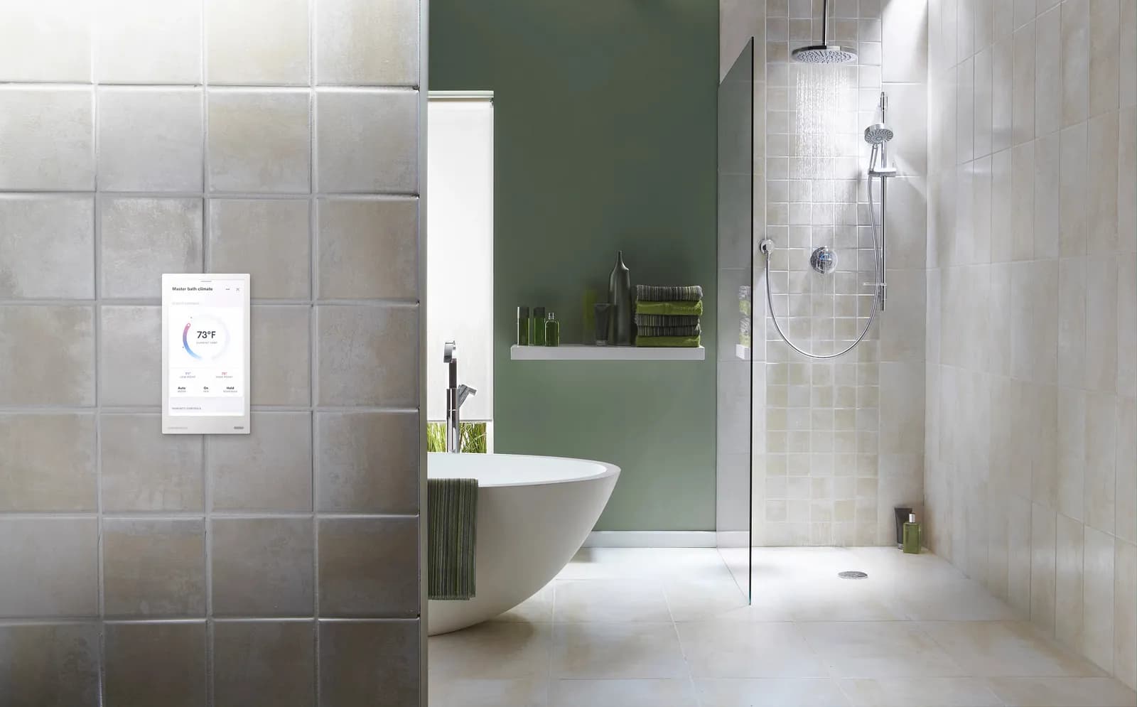Tiled bathroom with a wall touch screen showing climate controls